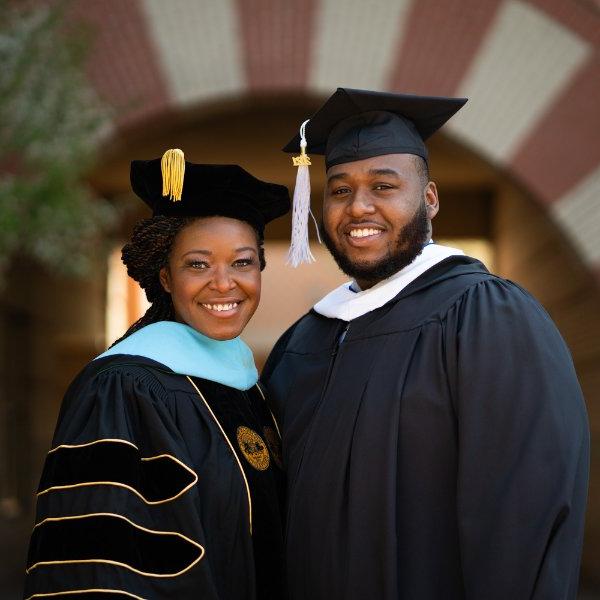 photo of Cordell Zachery and his mother, Alena Zachery-Ross, both in academic regalia