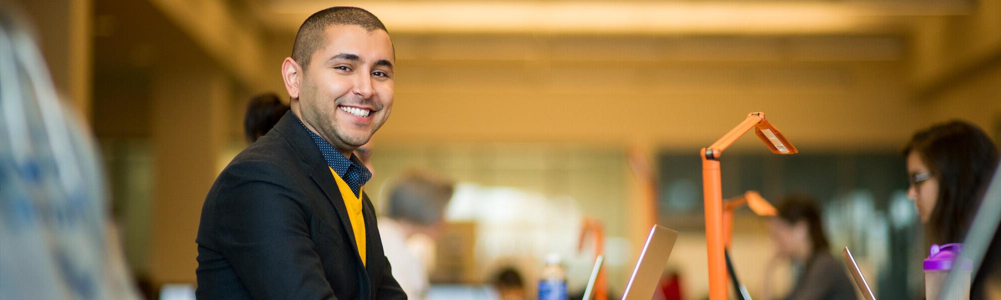 GVSU student photographed in the classroom.